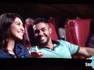 Stroking her big cock in the movie theatre and cumming on the popcorn